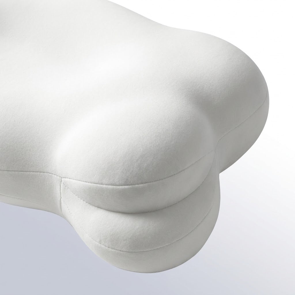 White satin pillow on a light gray background