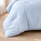 Close-up of a Baby Blue CloudSoft comforter corner, showing the thick, tufted fill