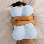 Cloudcradle Pillow nice neckpillow a girl squeezing the pillow.