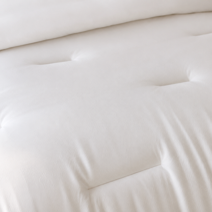 Close-up of a white mattress with a soft texture