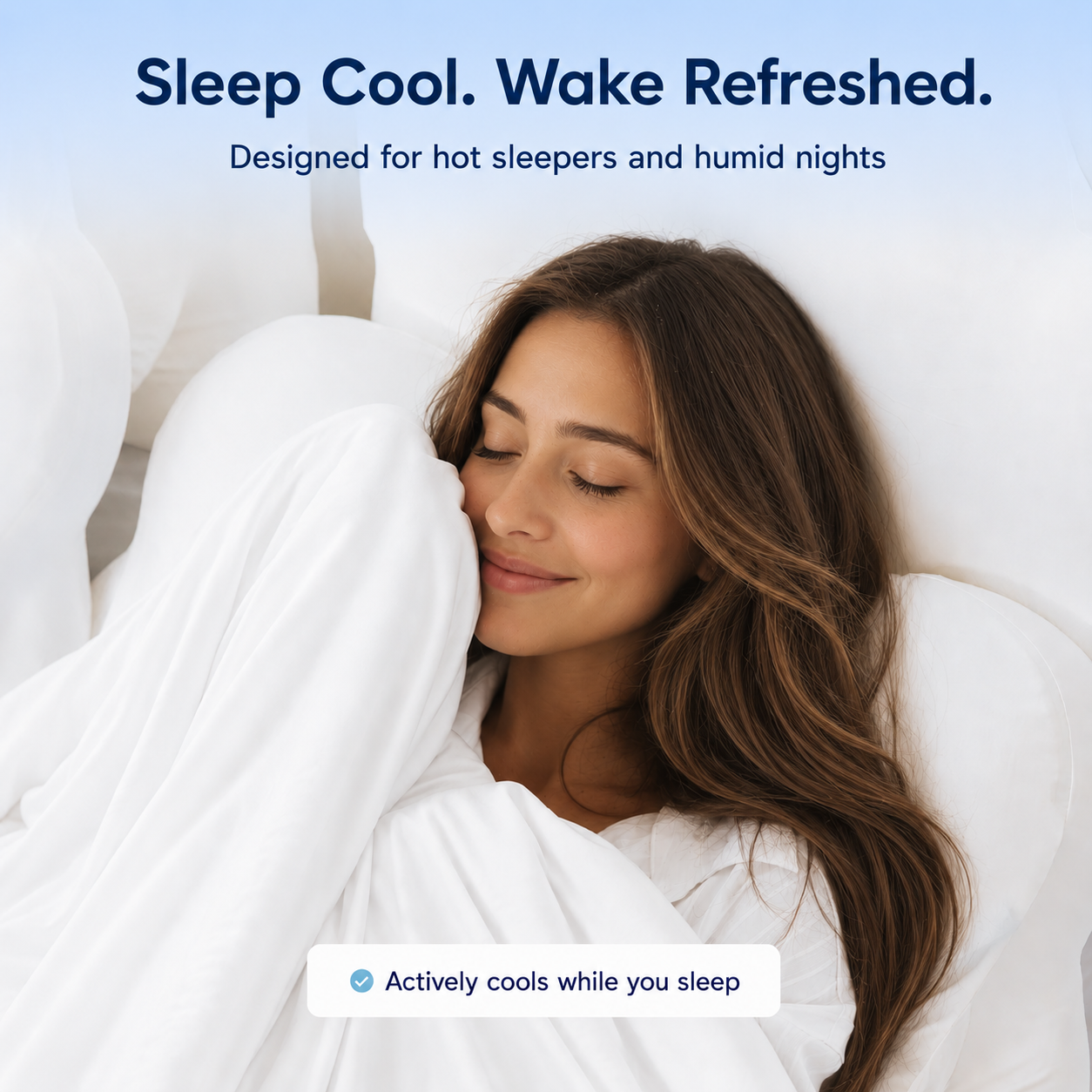 A woman sleeping peacefully in bed wrapped in white bedding, with promotional text at the top reading 'Sleep Cool. Wake Refreshed.